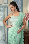 Shop_Two Sisters By Gyans x AZA_Green Georgette Embellished Sequin Pre-draped Ruffle Saree With Blouse _at_Aza_Fashions