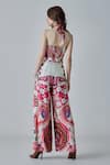 Shop_Saaksha & Kinni_Ivory Satin Printed Paisley Halter Alexa Jumpsuit With Belt _at_Aza_Fashions