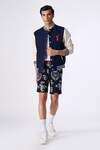 Buy_S&N by Shantnu Nikhil_Blue Poly Blend Embroidered Batsman Logo Varsity Jacket_at_Aza_Fashions