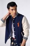 Shop_S&N by Shantnu Nikhil_Blue Poly Blend Embroidered Batsman Logo Varsity Jacket_Online_at_Aza_Fashions