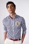Shop_S&N by Shantnu Nikhil_Blue Poly Blend Embroidered Striped Patch Logo Pattern Shirt_Online_at_Aza_Fashions