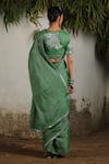 Shop_SAKSHAM & NEHARICKA_Green Cotton Zari Hand Embroidered Floral Plunged Border Saree With Blouse _at_Aza_Fashions