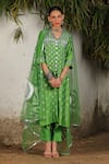 SAKSHAM & NEHARICKA_Green Chanderi Hand Embroidered Floral V Neck Aamaal Kurta Pant Set  _Online