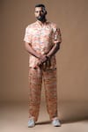 Buy_KHUSHBOO HARAN BORKAR_Peach Cupro Satin Printed Wave Shirt Pant Co-ord Set _at_Aza_Fashions