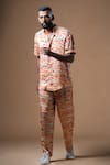 Shop_KHUSHBOO HARAN BORKAR_Peach Cupro Satin Printed Wave Shirt Pant Co-ord Set _Online_at_Aza_Fashions