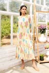 Buy_ISSA STUDIO BY CHETANA & SWATHI_Yellow Chiffon Floral Round Noah Tiered Midi Dress _at_Aza_Fashions