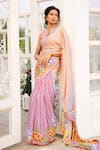 ISSA STUDIO BY CHETANA & SWATHI_Orange Crepe Embellished Sequin Notched Round Myra Scallop Hem Saree With Blouse _Online_at_Aza_Fashions