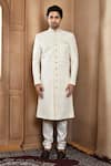 Shop_Aryavir Malhotra_Off White Sherwani Art Silk Embroidery Resham Flower Bloom With Churidar _Online_at_Aza_Fashions