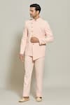 Buy_Aryavir Malhotra_Peach Terry Rayon Asymmetric Button Down Bandhgala With Trouser_at_Aza_Fashions