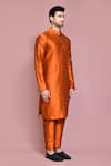Aryavir Malhotra_Orange Raw Silk Solid Straight Kurta And Pyjama Set_at_Aza_Fashions