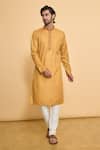 Buy_Arihant Rai Sinha_Yellow Polyester, Cotton Embroidery, Sequins Bandhani Print Kurta With Churidar _at_Aza_Fashions