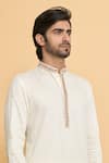 Shop Arihant Rai Sinha Cream Cotton, Polyester Embroidery Butti Pattern Kurta With Churidar Online at Aza Fashions Shop_Arihant Rai Sinha_Cream Cotton, Polyester Embroidery Butti Pattern Kurta With Churidar _Online_at_Aza_Fashions