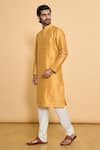 Shop_Arihant Rai Sinha_Yellow Kurta Poly Blend Solid Plain Mandarin Collar And Churidar Set _Online_at_Aza_Fashions