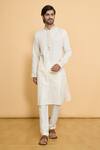 Buy_Arihant Rai Sinha_Cream Kurta Poly Jacquard Woven Placket Thread Embroidered And Churidar Set _at_Aza_Fashions