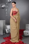 Talking Threads_Gold Chiffon Embellished Sequins Encrusted Saree With Bloom Corset  _at_Aza_Fashions