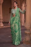 Buy_DiyaRajvvir_Green Crepe Printed Floral Round Thikri Pre-draped Sharara Saree With Blouse_at_Aza_Fashions