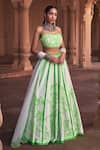 Buy_DiyaRajvvir_Green Tulle Embroidery Cutdana Sweetheart Neck Jasmine Sequin Lehenga Set_at_Aza_Fashions