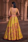 Shop_DiyaRajvvir_Yellow Tulle Embroidery Cutdana V Neck Zinnia Fleur Sequin Lehenga Set_at_Aza_Fashions