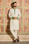 Buy_DiyaRajvvir_White Dola Silk Embroidered Mirror Cuff Sleeve Kurta And Pant Set_at_Aza_Fashions
