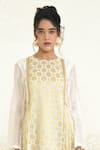 Rishi and Vibhuti_Ivory Brocade Woven Floral Round Adriel Anarkali _Online_at_Aza_Fashions