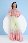 Mandira Wirk_Green Chiffon Printed Floral Halter Neck Blossom Jumpsuit_Online_at_Aza_Fashions