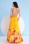 Shop_Mandira Wirk_Yellow Chiffon Printed Orchid Halter Maxi Dress_at_Aza_Fashions