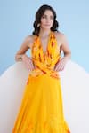 Shop_Mandira Wirk_Yellow Chiffon Printed Orchid Halter Maxi Dress_Online_at_Aza_Fashions