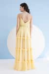 Shop_Mandira Wirk_Yellow Viscose Georgette Embellished Floral Halter Tiered Neck Maxi Dress _at_Aza_Fashions