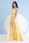 Buy_Mandira Wirk_Yellow Viscose Georgette Embellished Floral Halter Tiered Neck Maxi Dress _Online_at_Aza_Fashions