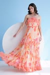 Buy_Mandira Wirk_Orange Chiffon Printed Floral Halter Pleated Maxi Dress _at_Aza_Fashions