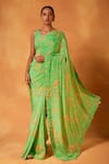 Buy_Saundh_Green Saree Natural Crepe Print Nargis Flower With Unstitched Blouse Piece _at_Aza_Fashions