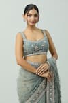 JAYANTI REDDY_Blue Raw Silk Hand Embroidery Floral Scoop Neck Flower Blouse _Online_at_Aza_Fashions