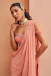 Chhavvi Aggarwal_Pink Georgette Embroidery Sequin Sharara Saree With Corset Blouse _Online_at_Aza_Fashions