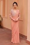 Buy_Chhavvi Aggarwal_Pink Georgette Embroidery Cutdana V Neck Stripe Lehenga Saree With Blouse _at_Aza_Fashions