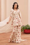 Chhavvi Aggarwal_Ivory Crepe Printed Floral V Neck Peplum Kurta Sharara Set _Online_at_Aza_Fashions