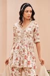 Buy_Chhavvi Aggarwal_Ivory Crepe Printed Floral V Neck Peplum Kurta Sharara Set _Online_at_Aza_Fashions