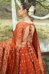 Safaa_Orange Vegan Silk Woven Floral Booti Square Neck The Minara Lehenga Set _at_Aza_Fashions