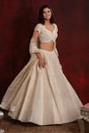 Buy_Shikha and Srishti Design_Ivory Crepe Embroidered Sequins Leaf Neck Blouse And Lehenga Set _at_Aza_Fashions