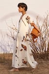 Kharakapas_Off White Cotton Mul Printed Abstract Bird V Neck Ghironi Jumpsuit  _at_Aza_Fashions