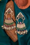 Buy_Mero Jewellery_Silver Plated Kemp Stones Floret Carved Dangler Earrings _at_Aza_Fashions