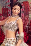 Shop_Mayyur Girotra Couture_Ivory Raw Silk Embellished Floral Tread Embroidered Bridal Lehenga Set _at_Aza_Fashions