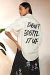 Masaba_White 100% Cotton Printed Dont Bottle It Up Slogan Collar Shirt_at_Aza_Fashions