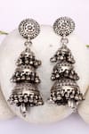 Shop_Sangeeta Boochra_Silver Plated Ghunghroo Carved Three Layered Jhumkas_at_Aza_Fashions