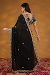 Shop_House Of Supriya_Black Georgette, Silk Embroidery, Tassels, Floral Scalloped Saree With Blouse _at_Aza_Fashions