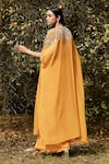 Basanti - Kapde Aur Koffee Orange Georgette Sequins, Cut Work, Floral Embroidered Cape And Dhoti Pant Set at Aza Fashions Basanti - Kapde Aur Koffee_Orange Georgette Sequins, Cut Work, Floral Embroidered Cape And Dhoti Pant Set _at_Aza_Fashions