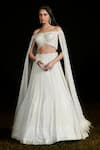 Buy_Basanti - Kapde Aur Koffee_Ivory Georgette Sequins, Tassels, Lehenga With Off Shoulder Draped Blouse_at_Aza_Fashions