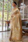 Geroo Jaipur_Gold Banarasi Silk Woven Zari Bloom Saree With Unstitched Blouse Piece_at_Aza_Fashions