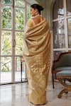 Shop_Geroo Jaipur_Gold Banarasi Silk Woven Zari Bloom Saree With Unstitched Blouse Piece_at_Aza_Fashions