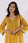 Pants and Pajamas_Yellow Dobby Cotton Embroidered Thread Notched Kurta And Flared Pant Set _Online_at_Aza_Fashions