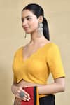 Buy_Nazaakat by Samara Singh_Yellow Linen Cotton Solid Scalloped V-neck Fitted Blouse_Online_at_Aza_Fashions